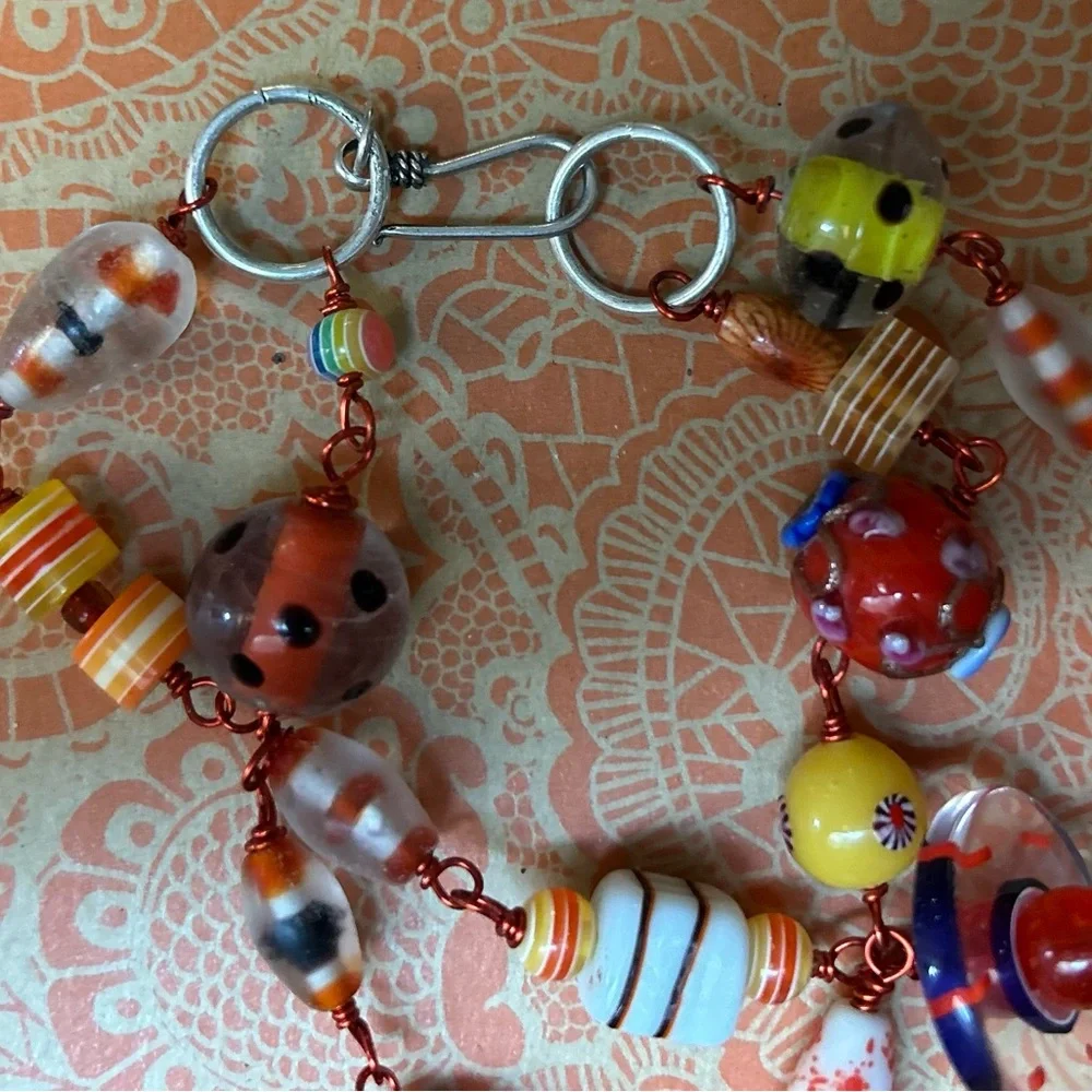 Glass Bead Bracelet with funky orange wire